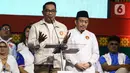Pasangan calon gubernur-wakil gubernur DKI Jakarta nomor urut satu Ridwan Kamil (kiri) dan Suswono saat debat kedua Pemilihan Gubernur DKI Jakarta pada Pemilihan Kepala Daerah (Pilkada) Serentak 2024 di Beach City International Stadium, kawasan wisata Ancol, Jakarta Utara, Minggu (27/10/2024). (Liputan6.com/Angga Yuniar)