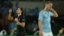 Ekspresi striker PSG, Edinson Cavani setelah mencetak gol ke gawang Malmo dalam laga Grup A Liga Champions di Stadion Parc des Princes, Paris, Prancis (15/9/2015). PSG menang 2-0 dalam partai tersebut. (AFP Photo/Jean-Sebastien Evrard)