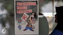 Poster penolakan perpanjangan pengelolaan JICT ditempel di sekitar lokasi aksi Tanjung Priok, Jakarta, Selasa (28/7/2015). Mereka menilai perpanjangan konsesi melanggar UU. (Liputan6.com/JohanTallo)