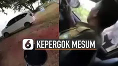 Setelah mengetahui kepergok, pria itu langsung memakai celana dan pindah ke kursi kemudi untuk kabur.