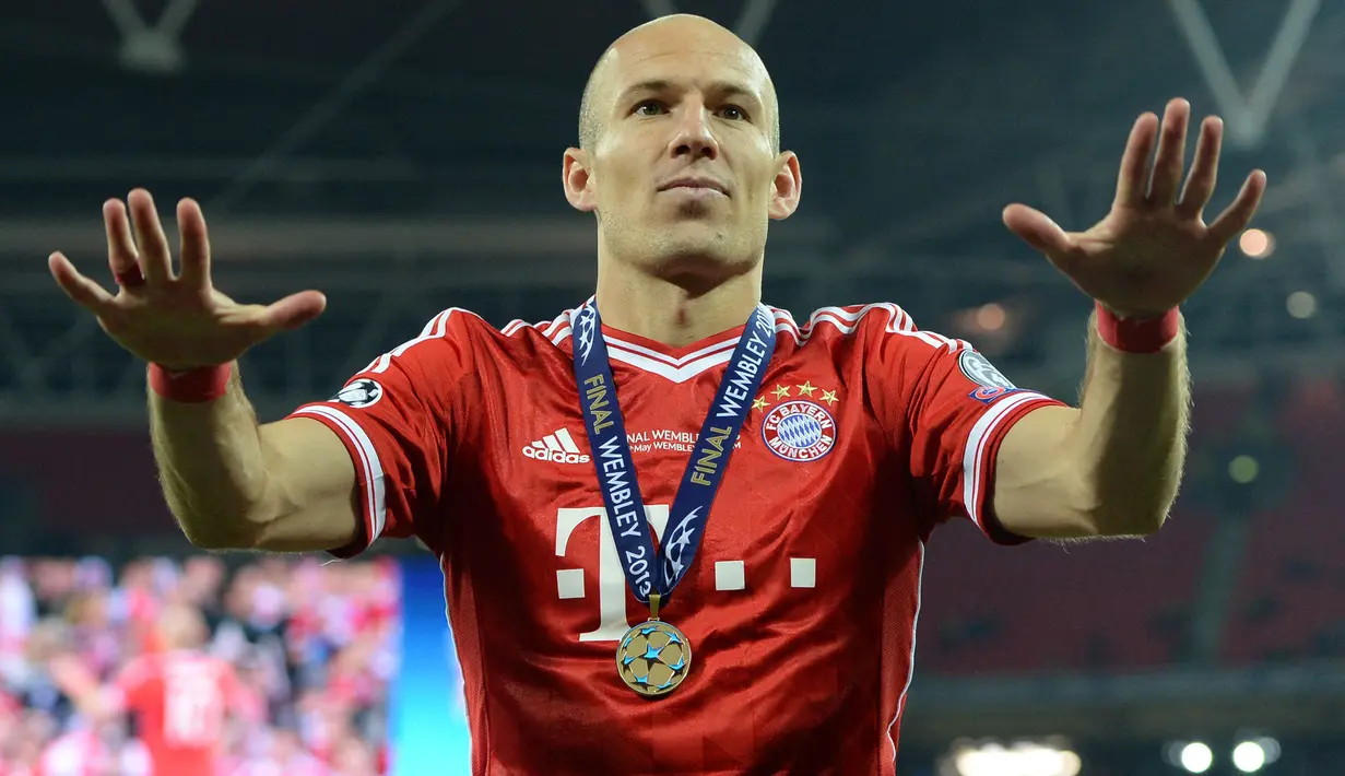 Sebelum menjadi seorang legenda Bayern Munchen, Arjen Robben pernah mengalami masa pahit bersama Chelsea setelah sering dilanda cedera. The Blues akhirnya menjual Robben ke Barcelona. Setelah dua tahun di Camp Nou, ia akhirnya merasakan gelar Liga Champions. (AFP/Patrik Stollarz)