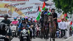 Aksi itu untuk menguatkan solidaritas dan dukungan yang mulai berkurang terhadap Palestina. (CHAIDEER MAHYUDDIN/AFP)
