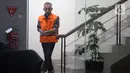 Pemeriksaan dilakukan di Gedung Merah Putih Komisi Pemberantasan Korupsi, Jakarta, Rabu (8/4/2026). Tampak dalam foto, tersangka kasus dugaan suap ijon proyek di lingkungan Pemerintah Kabupaten Bekasi, HM Kunang berjalan keluar Gedung Merah Putih Komisi Pemberantasan Korupsi, Jakarta, Rabu (8/4/2026). (Liputan6.com/Helmi Fithriansyah)