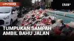 TUMPUKAN SAMPAH DI DEPAN PASAR RUBUH CIPONDOH TANGERANG MULAI DIBERSIHKAN