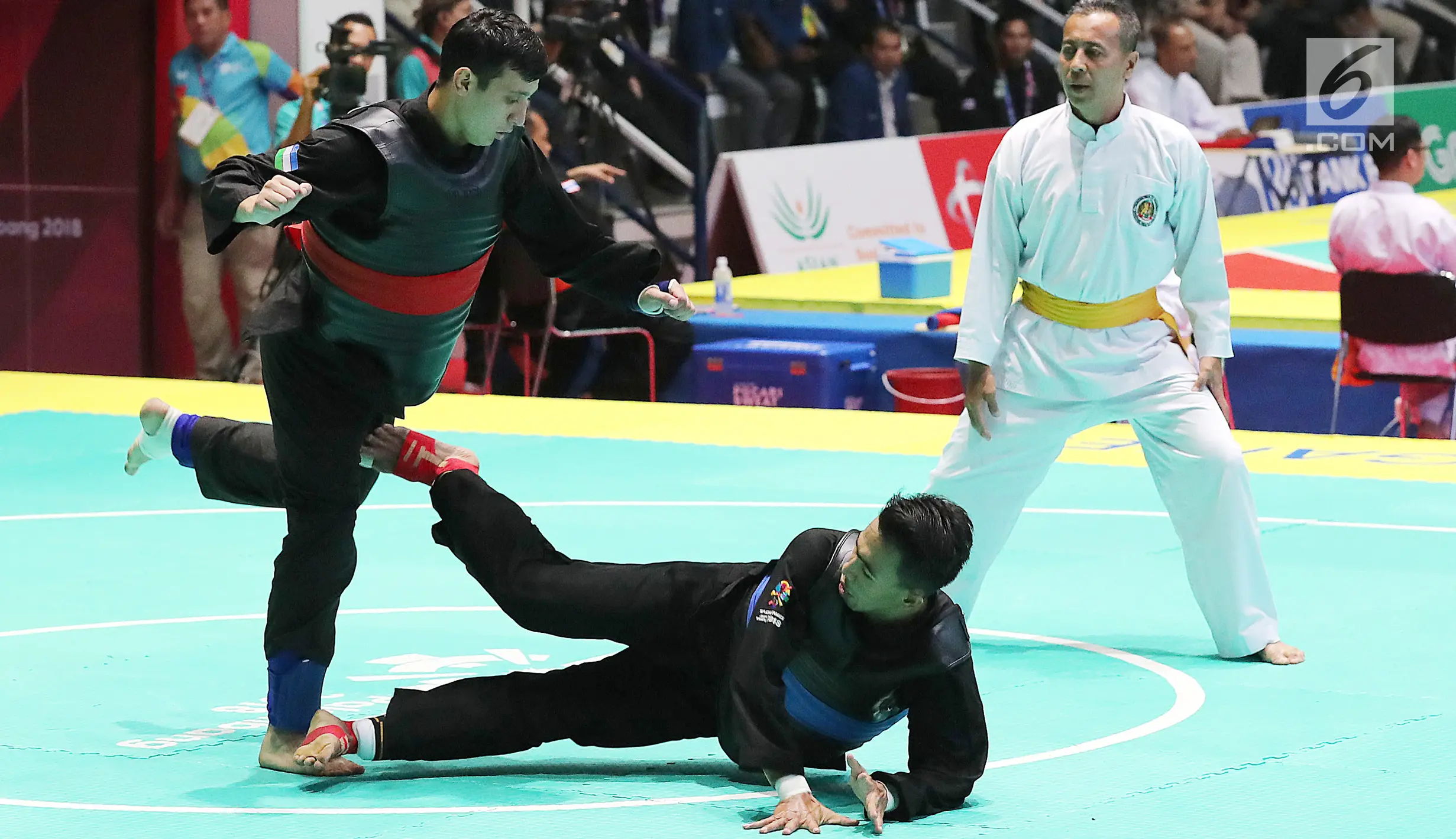 FOTO : Dua Pesilat Indonesia Masuk Delapan Besar - Foto Liputan6.com