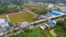 Foto dari udara menunjukkan pabrik kecap di Daqiao, sebuah kota di Hejiang, Provinsi Sichuan, China, 28 September 2020. Pembuatan kecap dengan cara tradisional yang melibatkan pengeringan di bawah terik matahari dan fermentasi memiliki sejarah lebih dari 100 tahun di Hejiang. (Xinhua/Jiang Hongjing)