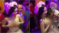  Pengunjung kelab yang ingin meremas-remas payudara 'pengantin' harus membayar sejumlah uang. (Sumber Daily Mail)