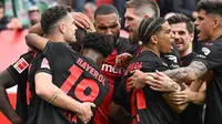 Kelima gol kemenangan Bayer Leverkusen disarangkan Victor Boniface pada menit ke-25, Granit Xhaka menit ke-60, dan hattrick Florian Wirtz pada menit ke-68, 83', serta 90'. (INA FASSBENDER / AFP)