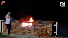 Detik-detik mengerikan saat seorang pria terbakar api pemanggang.