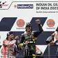 Pembalap Pramac Ducati Jorge Martin (kiri) saat merayakan podium dengan Marco Bezzecchi dan  Fabio Quartararo di MotoGP India yang berlangsung di sirkuit Buddh International (AFP)