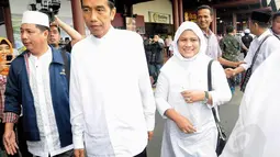 Jokowi pergi umrah bersama sang istri dan beberapa orang yang menjadi tim suksesnya (Liputan6.com/Faizal Fanani)
