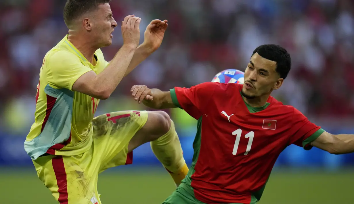 Spanyol berhasil melaju ke final sepak bola Olimpiade 2024 usai menang 2-1 atas Maroko. (AP Photo/Julio Cortez)