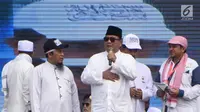 Calon presiden nomor urut 2, Prabowo Subianto menyampaikan pidato dalam reuni 212 di Lapangan Monas, Minggu (2/12/2018). Prabowo Subianto menolak berbicara politik atau berkampanye dalam ajang tersebut. (Liputan6.com/Herman Zakharia)