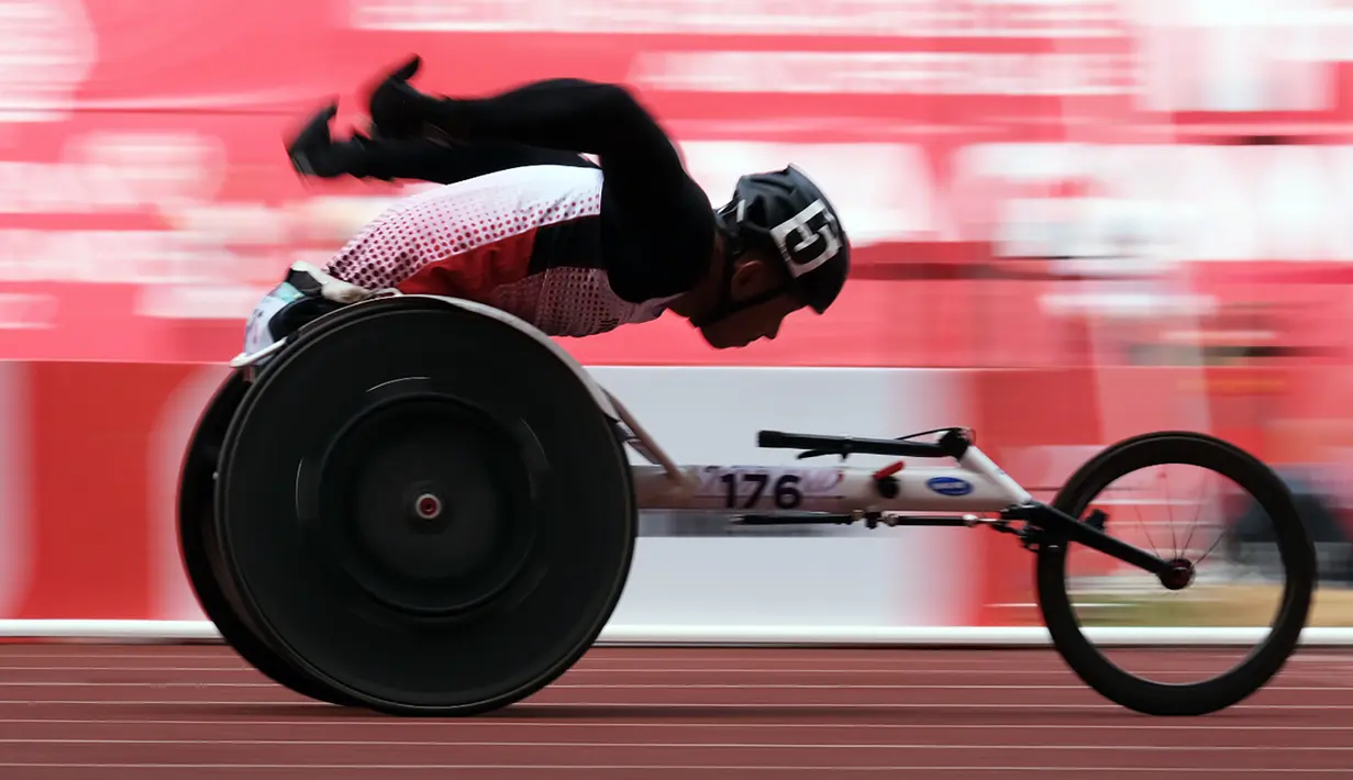 Jaenal Aripin sukses meraih medali emas di kelas T54 200 meter putra pada ASEAN Para Games 2022 di Stadion Manahan Solo, 2 Agustus 2022. (Foto: Dok. ASEAN Para Sports Federation)