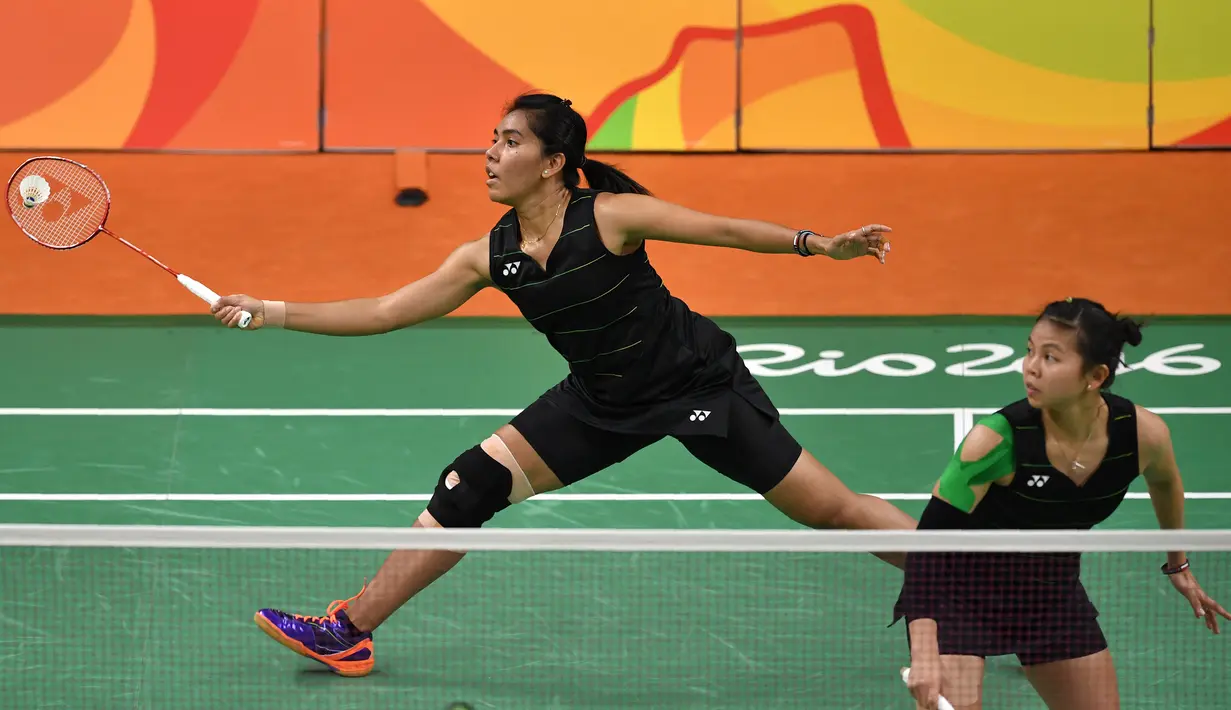 Greysia Polii/Nitya Krishinda Maheswari yang menempati unggulan ke-3 sukses menyapu 3 kemenangan di fase grup dan lolos ke babak perempatfinal sebagai juara grup. Sayang, mereka disingkirkan oleh pasangan Cina, Tang Yuanting/Yu Yang dua gim langsung, 11-21 dan 14-21. (Foto: AFP/Ed Jones)