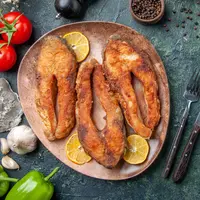 Ilustrasi ikan goreng/Copyright Freepik/mdjaff