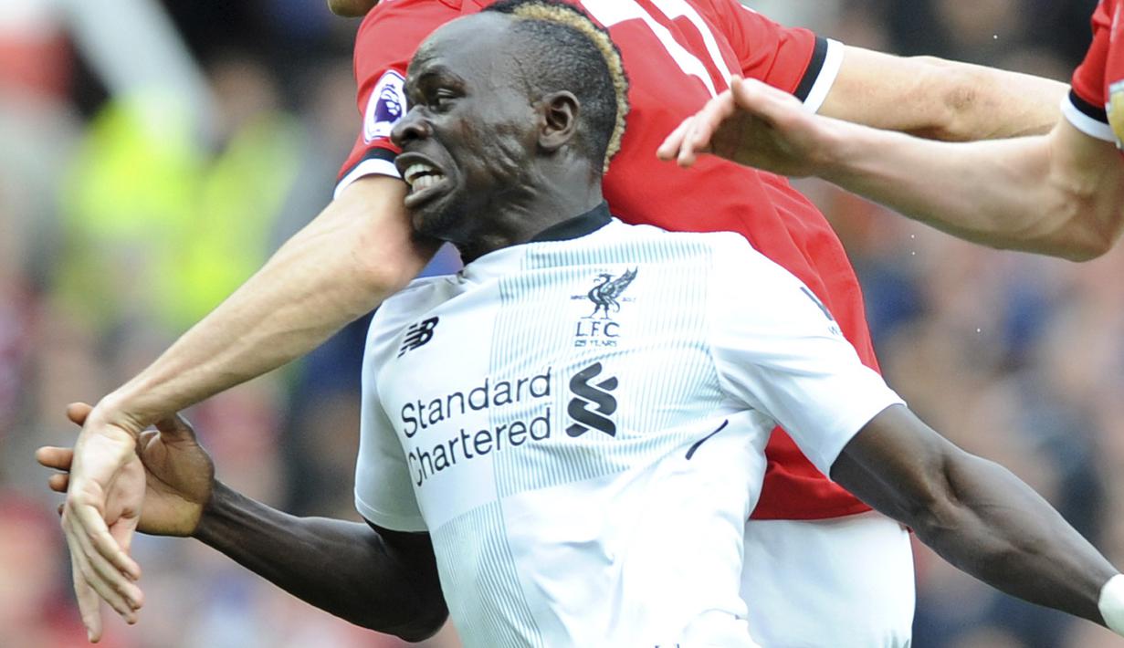Pemain Liverpool, Sadio Mane mencatatkan namanya sebagai salah satu kandidat top scorer Liga Champions, saat ini Mane sudah mengoleksi enam gol atau sama dengan rekannya Mohamed Salah. (AP/Rui Vieira)