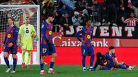 Hasil minor ini tidak hanya menghentikan laju Barcelona, tapi juga menggusur mereka dari puncak klasemen La Liga. (AP Photo/Joan Monfort)