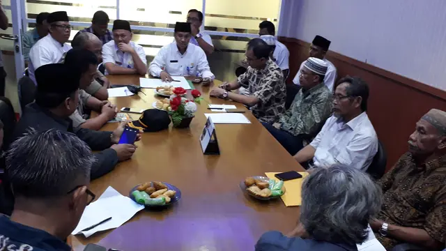 Mediasi warga Perumahan Taman Asri RW 012, Kelurahan Gaga, Kecamatan Larangan, Kota Tangerang. (Liputan6.com/Pramita)