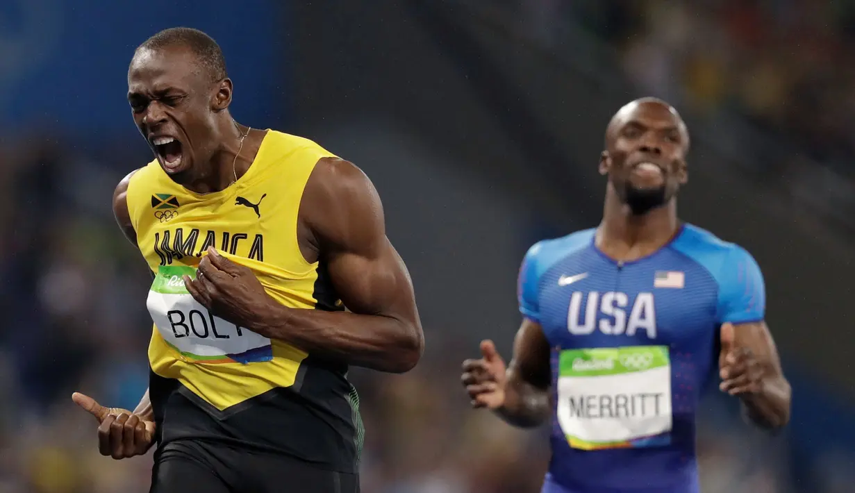 Hasil ini membuat Bolt mempertahankan medali emas di nomor lari 200 m di tiga Olimpiade beruntun. Sebelumnya Bolt menang di Olimpiade 2008 dan Olimpiade 2012. (AP Photo/David J. Phillip)