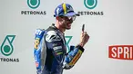 Pebalap MotoGP asal Spanyol dari tim BK8 Gresini Racing MotoGP, Alex Marquez, merayakan kemenangan setelah memenangkan balapan MotoGP Grand Prix Malaysia di Sirkuit Internasional Sepang, Sepang, pada Minggu 26 Oktober 2025. (Lillian SUWANRUMPHA/AFP)