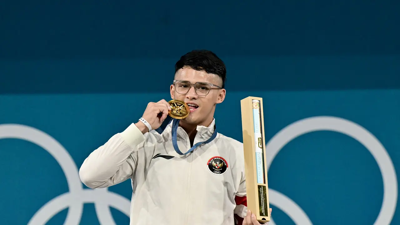 FOTO Rizki Juniansyah Raih Medali Emas di Olimpiade 2024