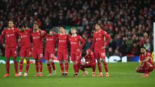 Para pemain Liverpool tampak putus asa saat adu penalti dalam pertandingan leg kedua babak 16 besar Liga Champions antara Liverpool dan Paris Saint-Germain di Anfield, Liverpool, Inggris, Selasa, 11 Maret 2025. (Foto AP/Jon Super)