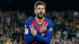 1. Gerrard Pique - Cristiano Ronaldo sering terlihat kesulitan mencetak gol saat Gerrard Pique berada di jantung pertahanan Barcelona. Tampil disiplin dan tak kenal kompromi membuat Ronaldo frustasi menembus benteng Blaugrana. (AFP/Pau Barrena)