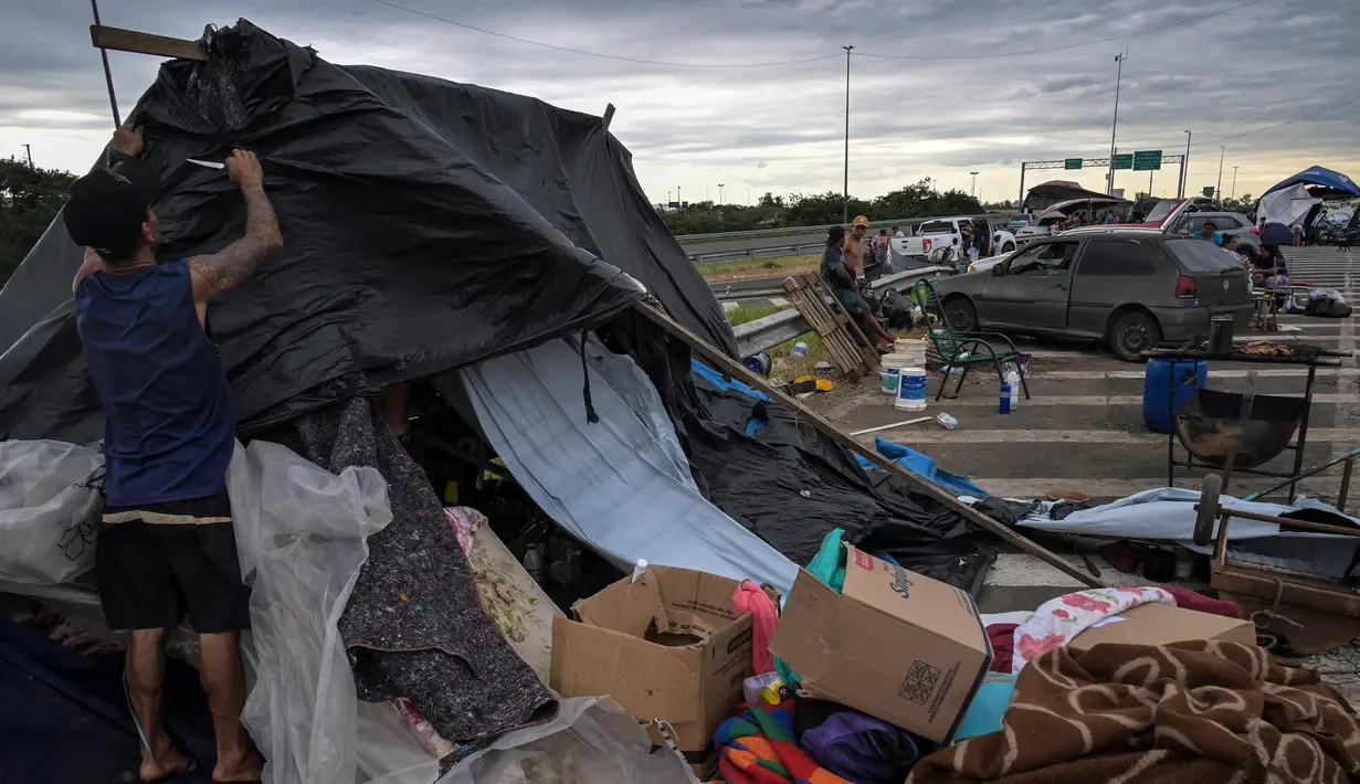 Otoritas pertahanan sipil Brasil mengatakan sekitar 128 orang masih dinyatakan hilang. (Nelson ALMEIDA/AFP)