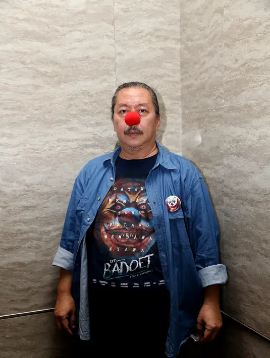 Bermain di film bergenre horor-thriller merupakan tantangan baru bagi Ronny di dunia perfilman tanah air.  Ia diharuskan berdandan sebagai badut yang dikemas dengan tampilan menyeramkan.  (Andy Masela/Bintang.com)