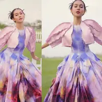 Intip detail penampilan Sandrinna Michelle dalam balutan gaun colorful yang disebut warganet seperti barbie hidup. (Instagram/sandrinna_11/winstongomez).