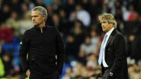 Mourinho - Pellegrini (JAVIER SORIANO / AFP)