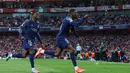 Hasilnya, pada menit ke-4, PSG unggul lebih dulu melalui gol cepat Ousmane Dembele. (Adrian Dennis/AFP)