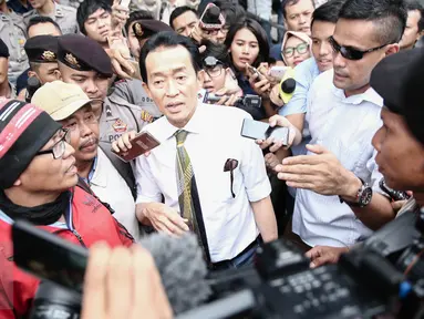 Edi Darmawan Salihin, ayah kandung dari Wayan Mirna Salihin seusai menghadiri sidang perdana kasus kopi sianida dengan terdakwa Jessica Kumala Wongso, di Pengadilan Negeri (PN) Jakarta Pusat, Rabu (15/6/2016). (Liputan6.com/Faizal Fanani)