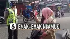 Ditegur karena tidak memakai helm. Emak-emak ini justru mengamuk kepada petugas.