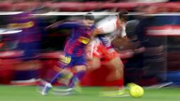 Langkah Blaugrana terjegal tuan rumah melalui kemenangan comeback 2-1 pada pertandingan yang berlangsung di Montilivi Stadium, Girona, Senin (16/02/2026) waktu setempat. (AFP/Josep Lago)