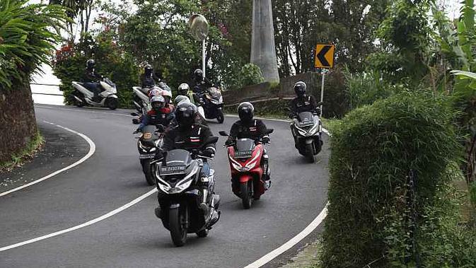 Honda PCX Luxurious Trip 2019 menjelajah Bali dengan jarak tempuh 393 kilometer. (AHM)