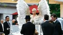 Namun, siapa sangka Katy Perry akan benar-benar menjadi seorang malaikat? (JOHN LAMPARSKI / GETTY IMAGES NORTH AMERICA / AFP)