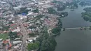 Keunggulan utama Situ Cipondoh terletak pada lokasinya yang berada di tengah kota dengan suasana relatif tenang. Tampak foto udara memperlihatkan area Situ Cipondoh di Kota Tangerang, Banten, yang tetap berfungsi sebagai kawasan konservasi air sekaligus destinasi rekreasi warga, Rabu (14/4/2026). (merdeka.com/Arie Basuki)