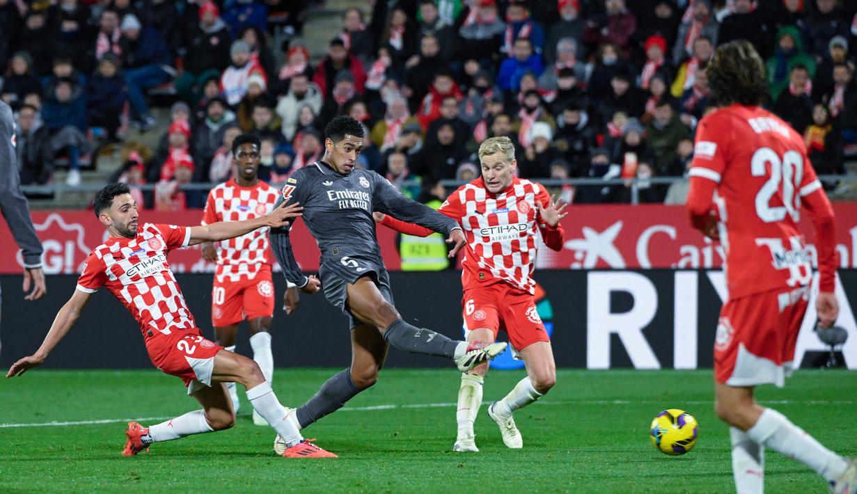 Real Madrid berhasil meraih kemenangan telak 3-0 atas Girona pada pekan ke-16 La Liga 2024/2025. (AFP/Josep Lago)
