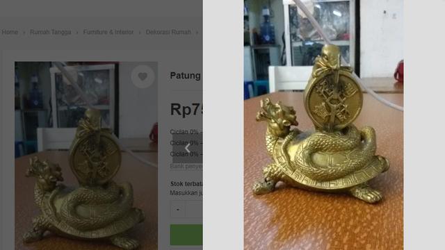 Patung kura-kura berlilit ular