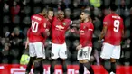 Para pemain Manchester United merayakan setelah Colchester United Ryan Jackson, mencetak gol bunuh diri selama pertandingan perempat final Piala Liga Inggris di Old Trafford (18/12/2019). MU menang telak 3-0 atas Colchester United dan melaju ke semifinal. (AP Photo/Jon Super)