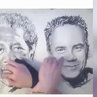 Orang Ini Melukis dengan Kedua Tangannya