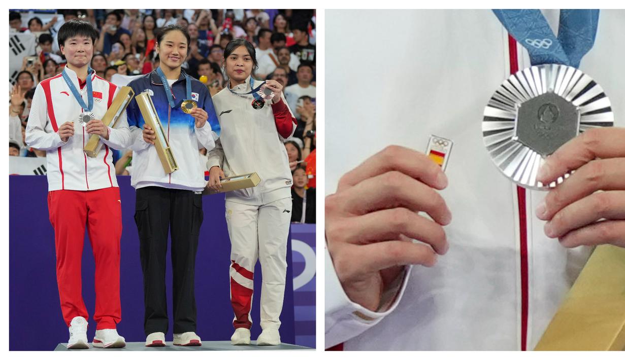 Pebulu tangkis tunggal putri China, He Bing Jiao banyak mendapatkan pujian setelah aksinya di atas podium Olimpiade Paris 2024, Senin (05/08/2024).  He Bing Jiao membawa pin kecil bergambar bendera Spanyol untuk memberikan penghormatan untuk Carolina Marin. Seperti diketahui, Marin, lawan dari He Bing Jiao di babak semifinal, terpaksa mengakhiri pertandingan lebih cepat karena cedera. He Bing Jiao berhasil menyabet medali perak setelah kalah dari An Se-young dua set langsung (13-21, 16-21). (AP Photo/Kin Cheung)
