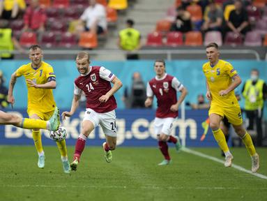 Ini bukan pertandingan yang mudah buat kedua tim. Siapapun yang sukses membawa pulang tiga poin akan dipastikan lolos ke babak 16 besar. Dan pada kesempatan ini, Austria-lah yang berhasil melakukannya. (Foto: AP/Vadim Ghirda)
