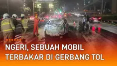 Kebakaran hebat dialami oleh sebuah mobil di gerbang tol Kuningan 2, Rabu malam (11/05/22)