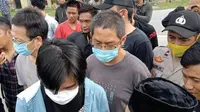TKA China yang diamankan saat demonstrasi mahasiswa di Kota Kendari.(Liputan6.com/Ahmad Akbar Fua)
