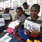 Anak Papua di lantai 3 Pasar Mama Papua. (Liputan6.com/Katharina Janur)