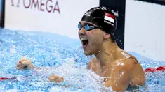  Ekspresi perenang putra Singapura, Joseph Schooling, setelah memenangi 100m gaya kupu-kupu putra Olimpiade Rio 2016 di Olympic Aquatics Stadium, Rio de Janeiro, Brasil, (12/8/2016). (Reuters/Marcos Brindicci)