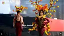 Penampilan Bella Bonita ini merupakan yang pertama kalinya runway di karnaval tersebar, Jember Fashion Carnaval 2024. Pada momen tersebut, istri Denny Caknan itu mengenakan kostum yang megah dan meriah. Ia tampil heboh kenakan busana dengan bunga-bunga mengelilingi tubuhnya. (Liputan6.com/IG/@dinas_kominfo_kab_jember)